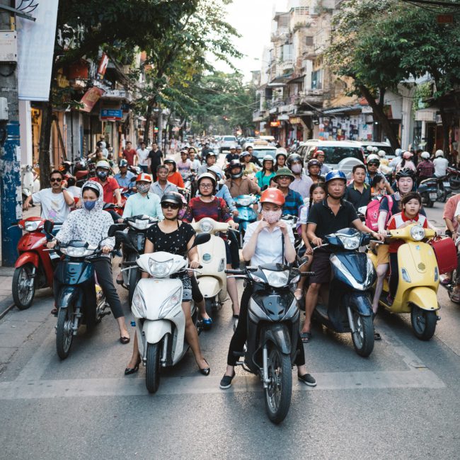 Scooter in Hanoi waiting for the traffic light [David Tan]